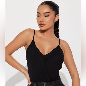 Black cropped spaghetti strap tank blouse in a size large